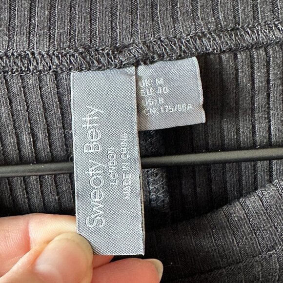 Women's 8 Sweaty Betty Black Ribbed Midi Dress Slim Fit Pleated Lettuce Hem - Picture 9 of 11